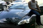 Picyure of D'Banj and his Aston Martin Vantage