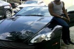 Picyure of D'Banj and his Aston Martin Vantage