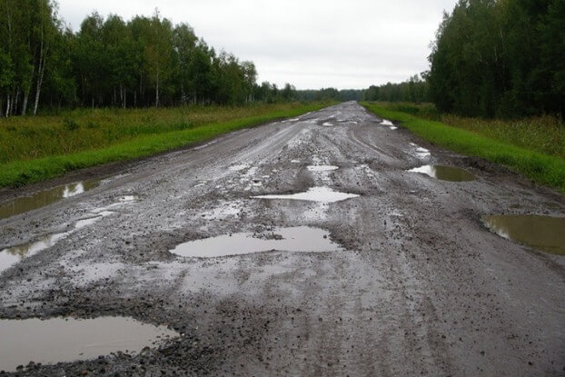 Image of a potholed road
