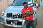 Diamond with his Toyota Prado.
Image Source: katejoshy.blogspot.com