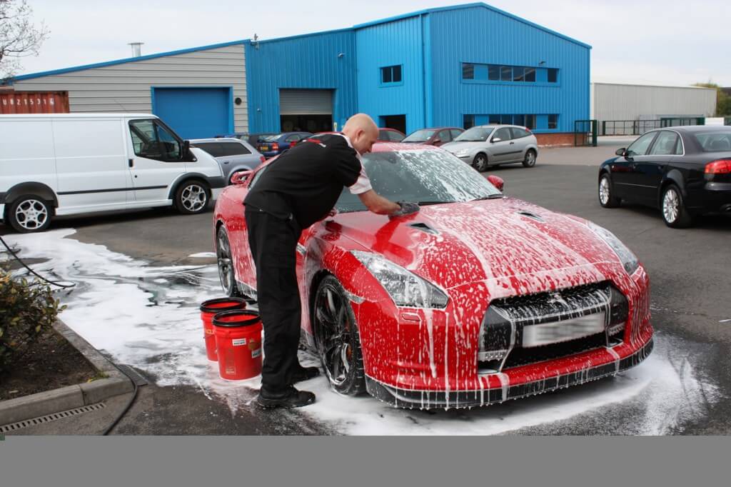 Washing a car Image source www.newcarselloff.com 1024x682 How To Maintain Your New Car